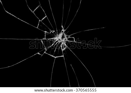 Broken glass on black background ,texture backdrop object design  Royalty-Free Stock Photo #370565555