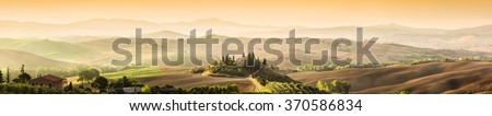 Tuscany, Italy landscape. Super high quality panorama taken at wonderful sunrise. Vineyards, hills, farm house. Royalty-Free Stock Photo #370586834