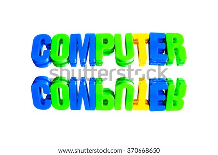 word computer from plastic letters on a white background
