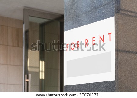 Rental Real Estate Sign in Front of building