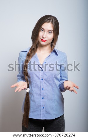 choosing between two options. Young business woman weighing the options, isolated