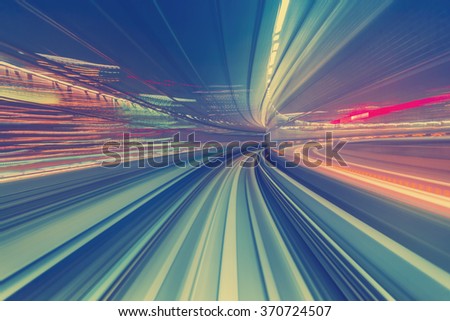 Abstract high speed technology POV motion blurred concept image from the Yuikamome monorail in Tokyo Japan Royalty-Free Stock Photo #370724507