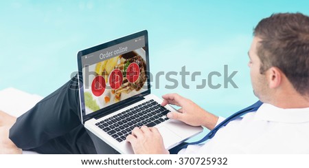 Food app against businessman using laptop