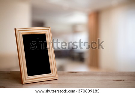 photo frame on the wooden table in the living room