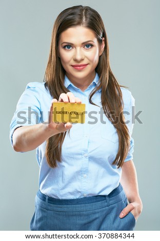 Woman Bank employee show credit card. Smiling business woman with long hair studio isolated portrait.