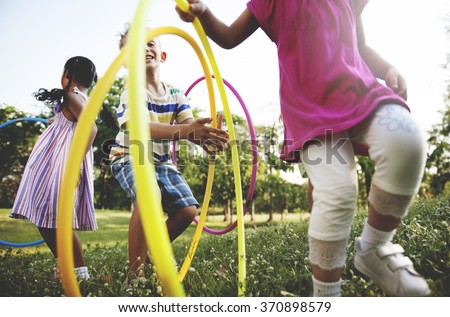 Child Children Childhood Hula Hoop Hooping Kids Concept Royalty-Free Stock Photo #370898579