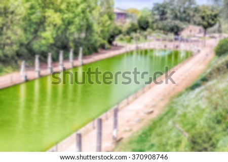Defocused background with ruins of Villa Adriana (Hadrian's Villa), Tivoli, Italy. Intentionally blurred post production for bokeh effect