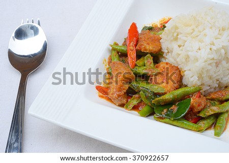 Stir fried crispy pork belly and red curry