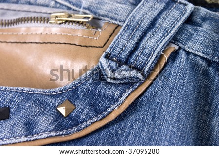 closeup of blue jeans with pocket.