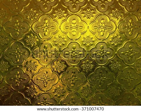 abstract yellow glass with Thai pattern 