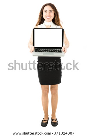 Business woman presenting copy space on laptop screen