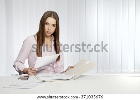business concept - portrait of a beauty young adult attractive pretty brunette businesswoman in office

