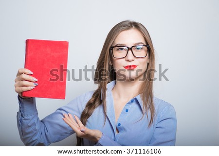 Beautiful business woman with glasses reading a book, isolated on background