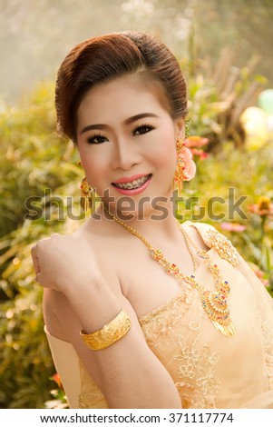 Soft Beautiful Thai women wearing typical Thai dress, identity culture of Thailand