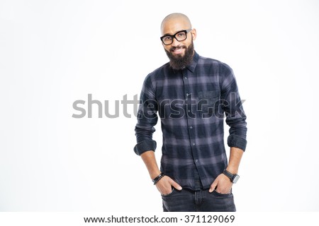 Smiling afro american man standing isolated on a white background and looking at camera