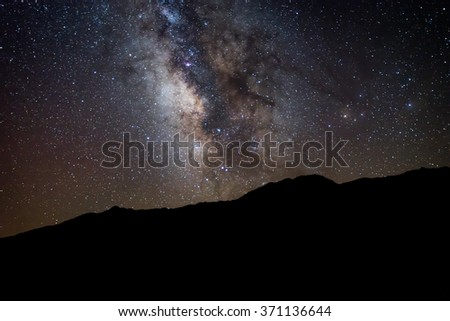 A view of the milky way galaxy rising over the Sierra Nevada Mountain Range