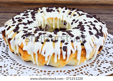 Curd Cake with White Icing and Chocolate Studio Photo