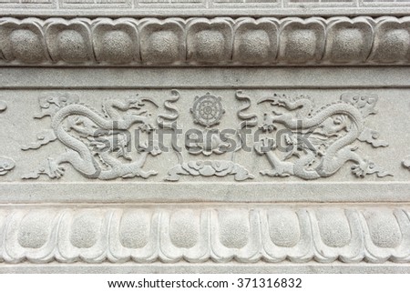 granite carving in chinese temple Royalty-Free Stock Photo #371316832