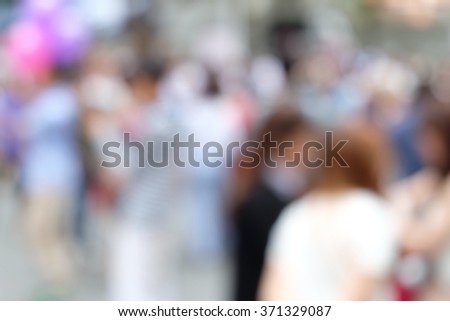 People walking on street in bankkok ,blurred background