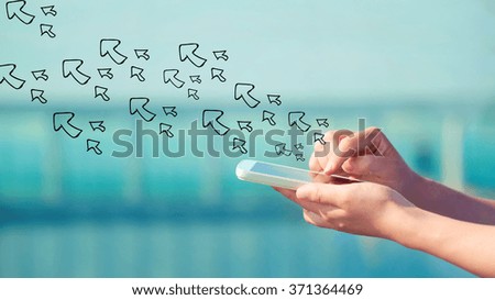 Arrows concept with person holding a smartphone 