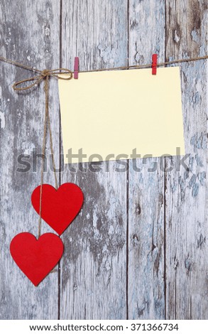 Love hearts  with Blank Photo  on wooden texture background, valentines day card concept