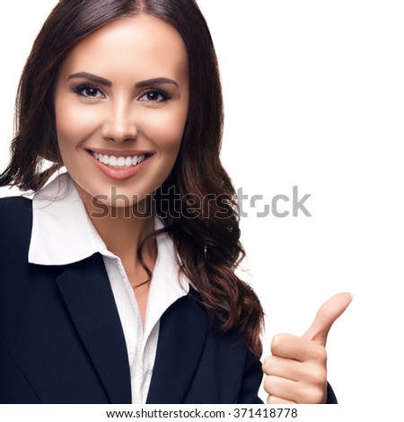 Happy smiling beautiful young businesswoman showing thumbs up gesture, isolated against white background