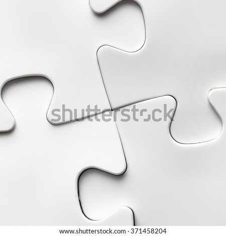 Placing missing a piece of puzzle. business concept. wooden background