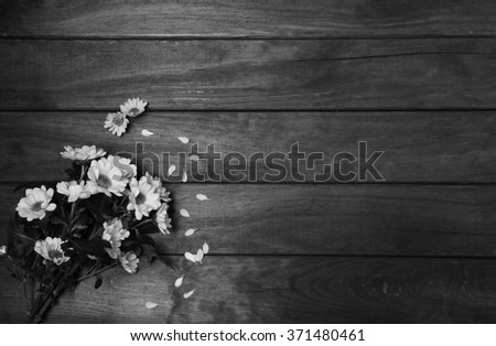 beautiful, fresh flowers on wooden background
