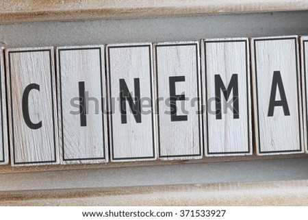 CINEMA word written on wooden