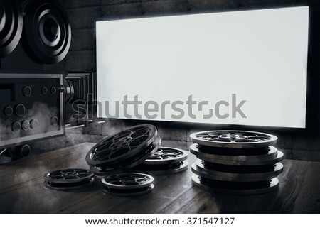 Old movie camera and film cartridge on a wooden table and a blank movie screen, mock up 3D Render