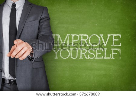 Improve yourself on blackboard with businessman