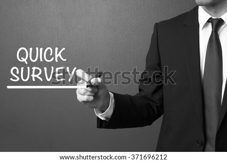 Business man writing - Quick Survey