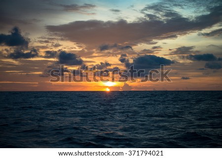 Offshore Sun Set in The Middle of The Ocean (Red and Yellow Sky)