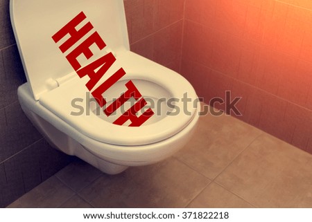 Toilet with an inscription "Health"