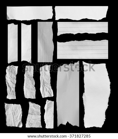 Set of torn paper on black. Copy space