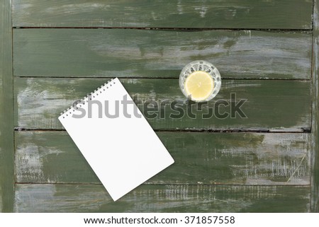 Fresh water with note on rustic table