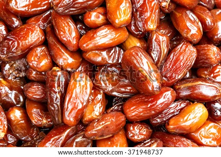 Date palm on a traditional craftsman market.Horizontal image. Royalty-Free Stock Photo #371948737