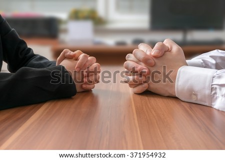 Interview or dialogue between politicians. Negotiation of two statesman with clasped hands in office. Royalty-Free Stock Photo #371954932