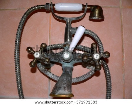 Retro faucet shower limescale.Battery has a classic rotary valves