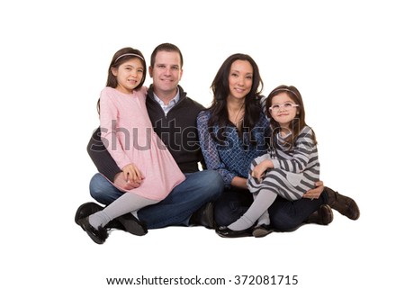 A beautiful family isolated on white