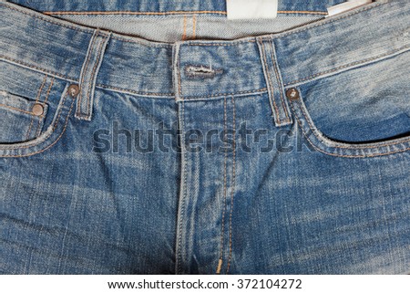 Denim texture or front of jean trouser for background