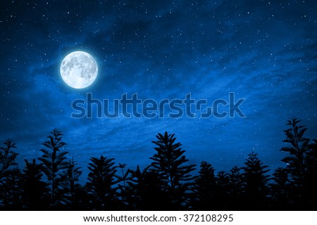 forest in silhouette with starry night sky and full moon , Elements of this image are furnished by nasa