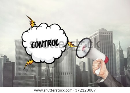 Control text on speech bubble and businessman hand holding megaphone