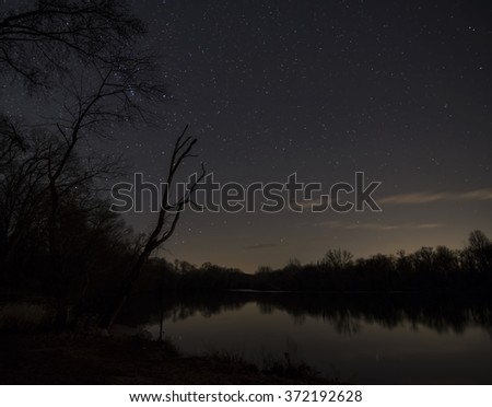 First stars of the night over the river