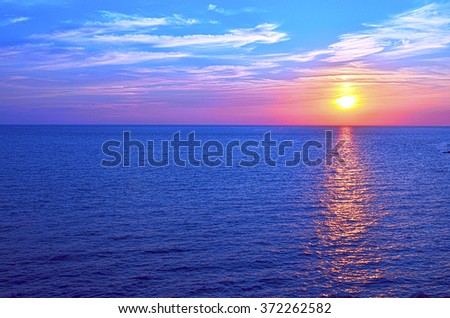 Sunset over ocean in Sevastopol in Crimea Royalty-Free Stock Photo #372262582