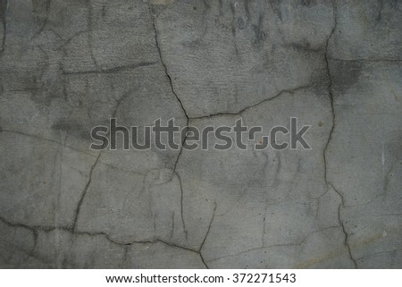 cracked concrete texture Royalty-Free Stock Photo #372271543