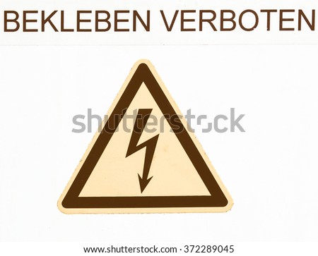  A traffic or a construction site sign - in German (Deutsch) - isolated over white background vintage