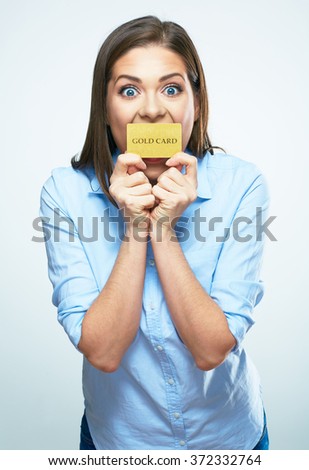 Funny smiling business woman hold credit card. White background isolated.