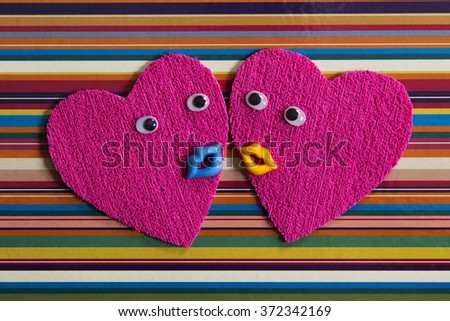 Pair of cheerful hearts.