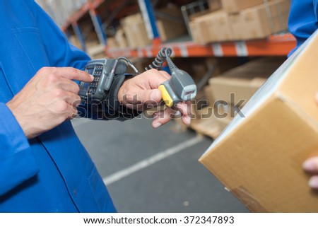 Finger scanner and wrist computer Royalty-Free Stock Photo #372347893